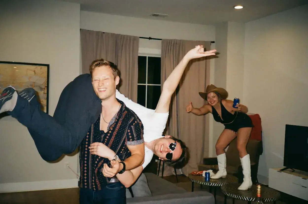 A candid film photograph of Ally and Marius