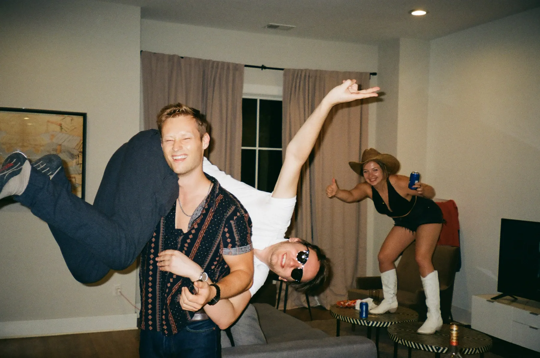 A candid film photograph from a night with friends
