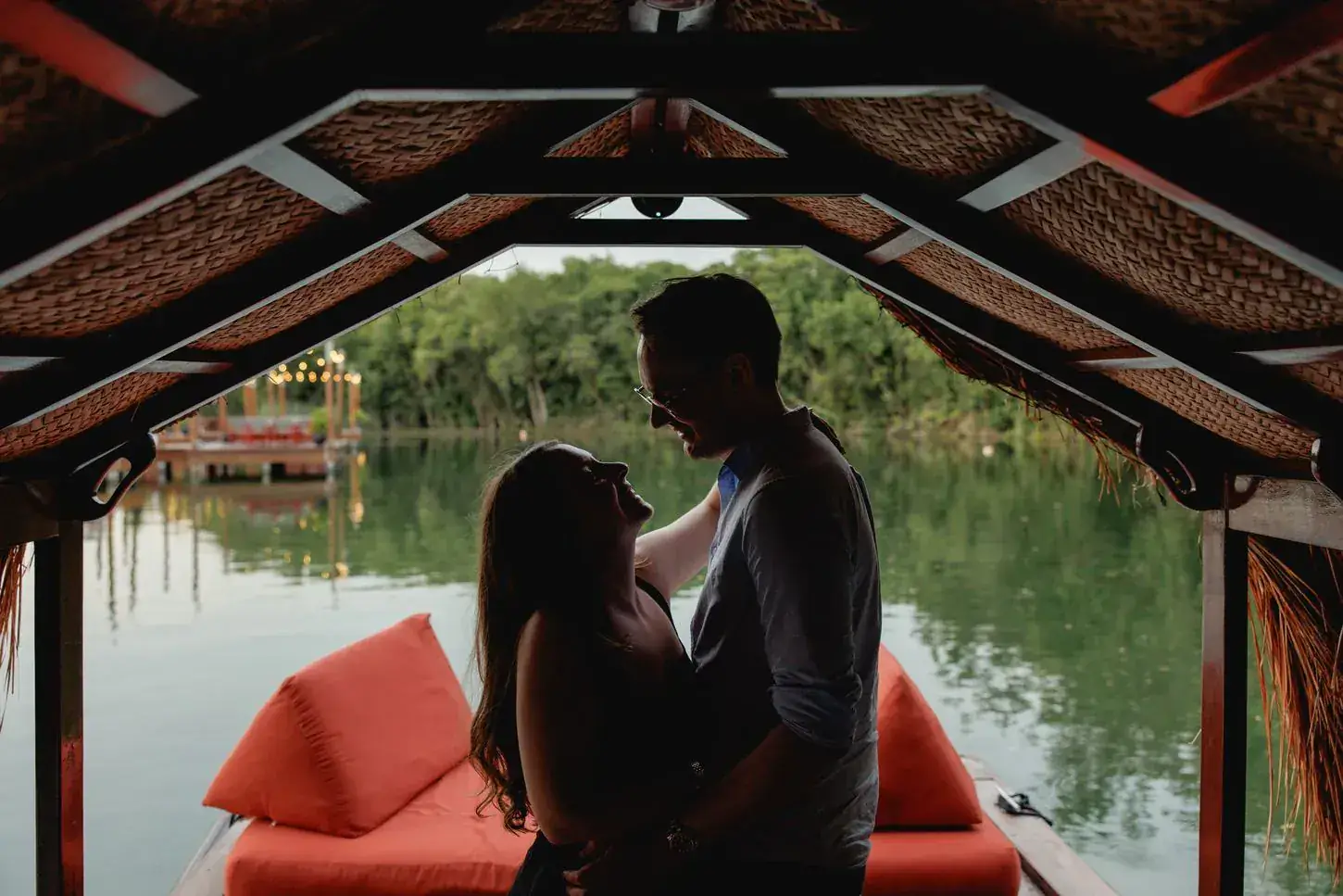 Ally and Marius walking together in a lush garden setting